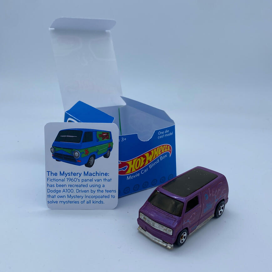 Full display of box, example of car, and a card that would be in the box as well.